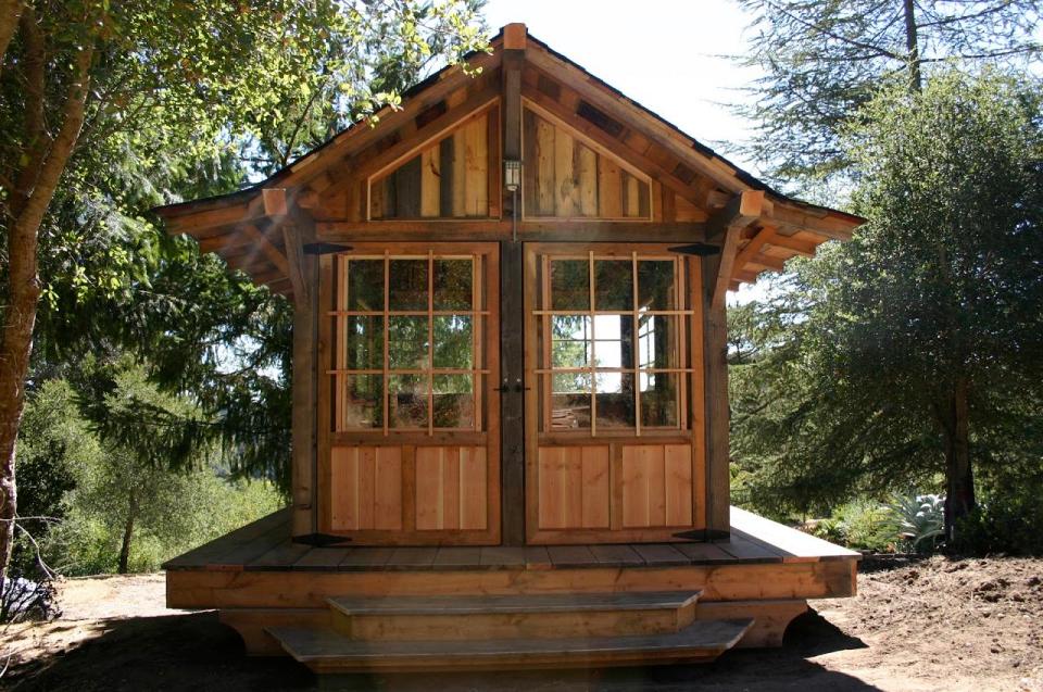 Tea house cabin in the woods by Molecule Tiny Homes