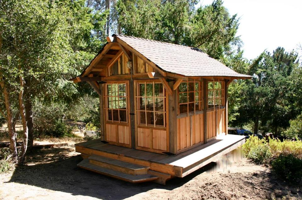 Tea house cabin in the woods by Molecule Tiny Homes