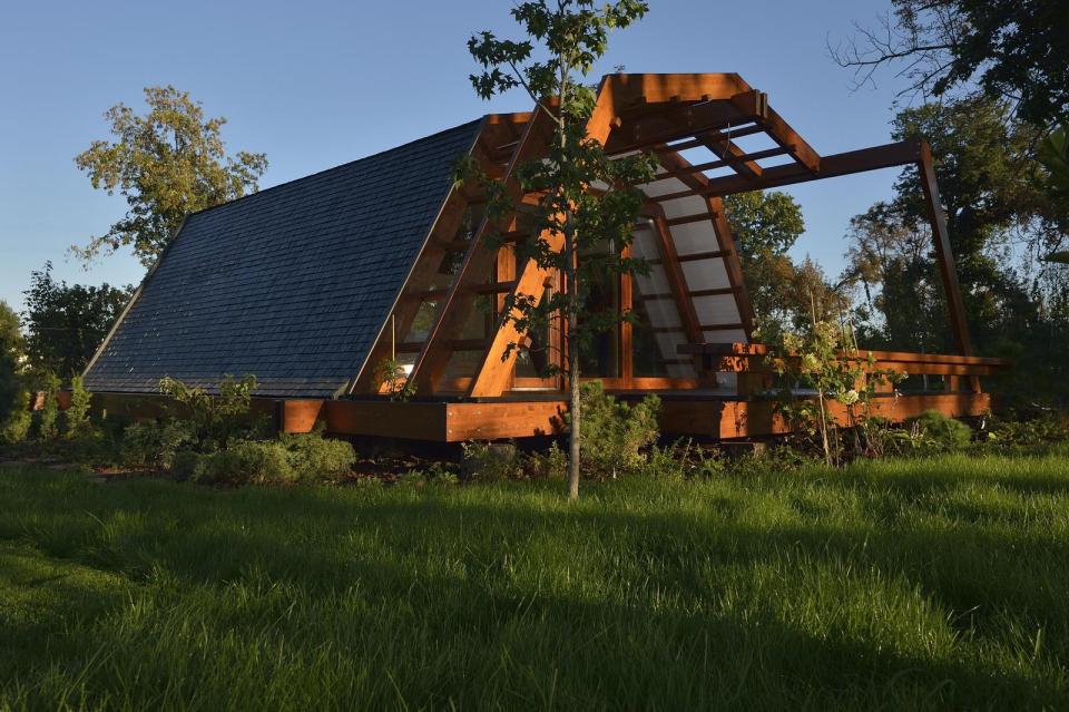 The Soleta zeroEnergy One, an eco-friendly modular house with an unusual gambrel roof design. It has 614 sq ft with a lofted bedroom. | www.facebook.com/SmallHouseBliss