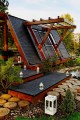 The Soleta zeroEnergy One, an eco-friendly modular house with an unusual gambrel roof design. It has 614 sq ft with a lofted bedroom. | www.facebook.com/SmallHouseBliss