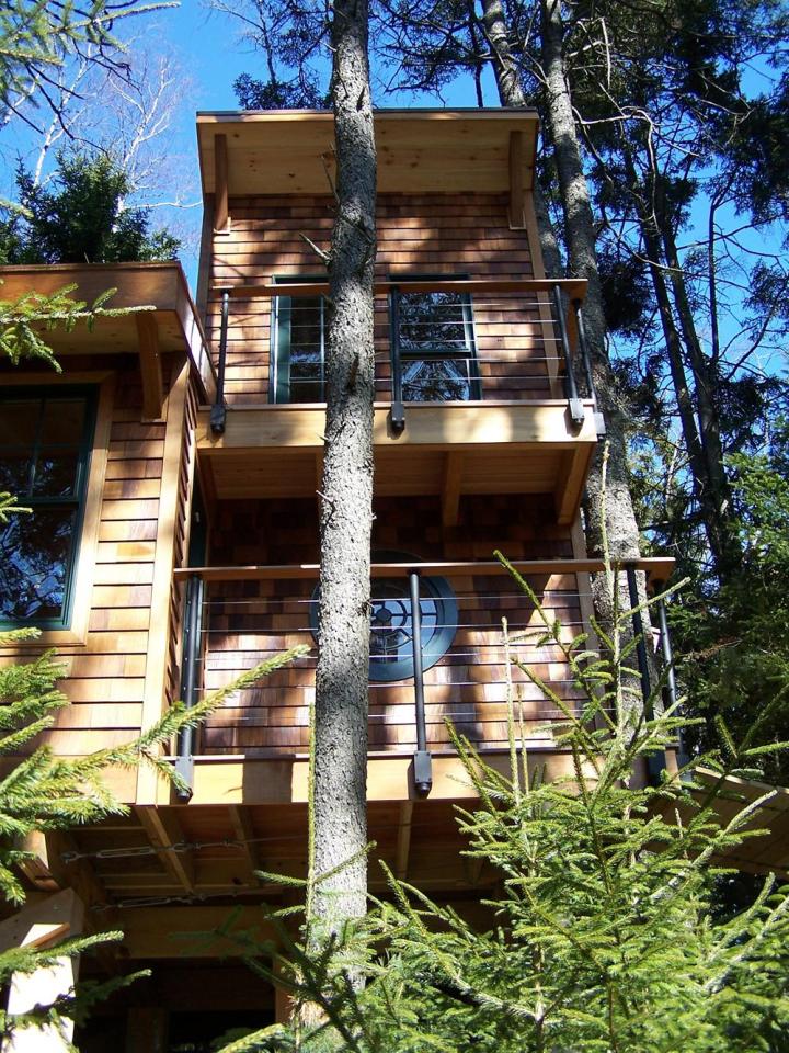 This 350 sq ft "treehouse" is used as a playhouse and family hangout space. | www.facebook.com/SmallHouseBliss
