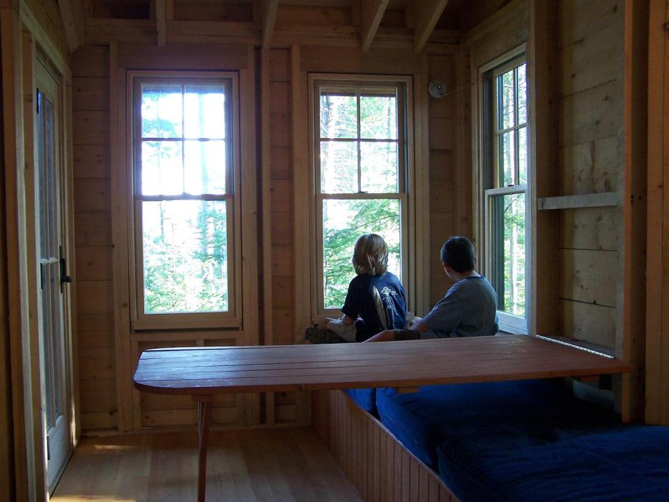 This 350 sq ft "treehouse" is used as a playhouse and family hangout space. | www.facebook.com/SmallHouseBliss