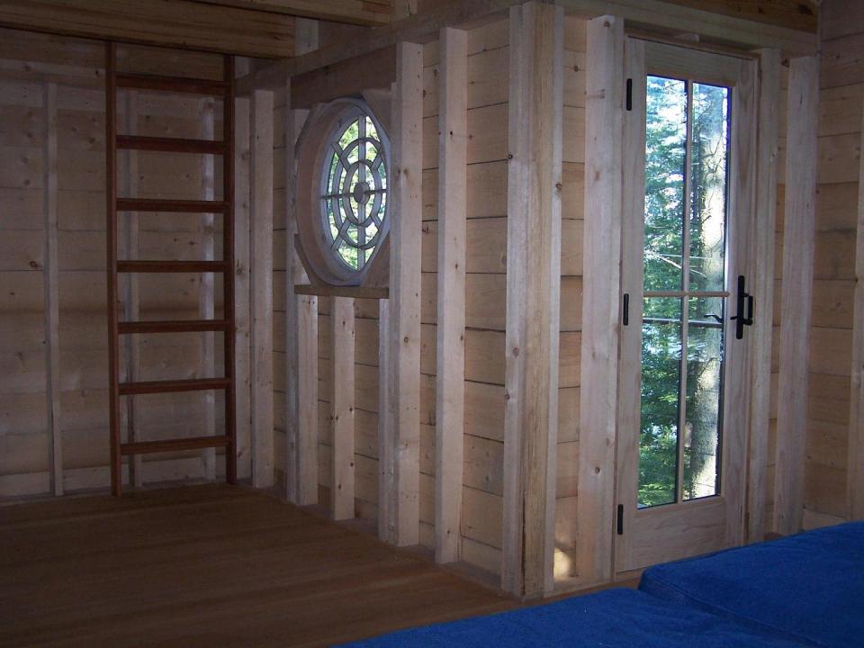 This 350 sq ft "treehouse" is used as a playhouse and family hangout space. | www.facebook.com/SmallHouseBliss