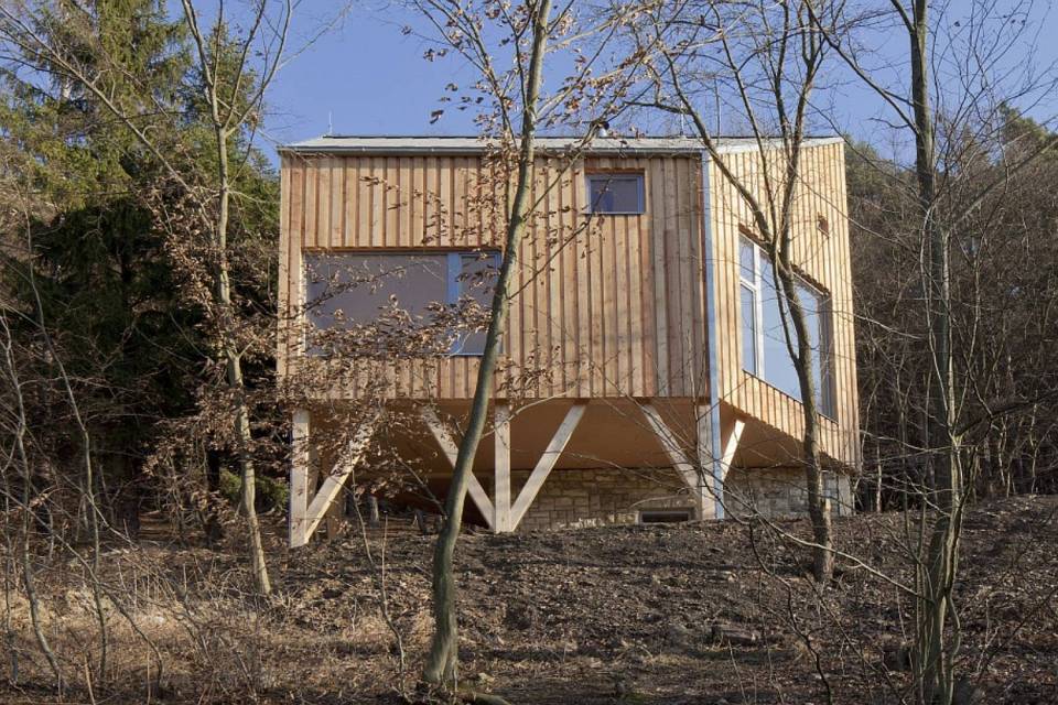 A hexagon-shaped plan was chosen to maximize views and daylight in this small house that has 2 bedrooms in 1,012 sq ft. | www.facebook.com/SmallHouseBliss