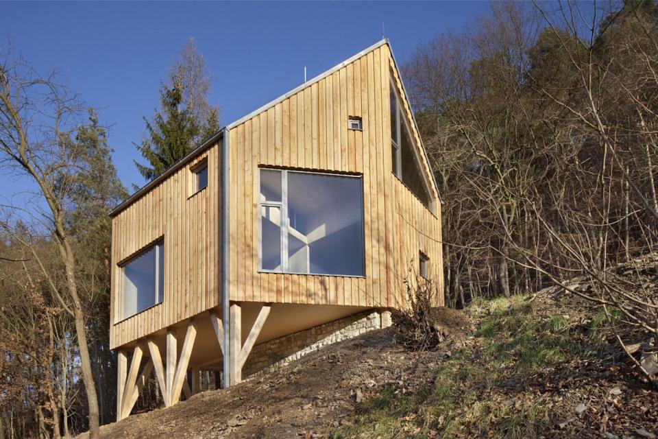 A hexagon-shaped plan was chosen to maximize views and daylight in this small house that has 2 bedrooms in 1,012 sq ft. | www.facebook.com/SmallHouseBliss