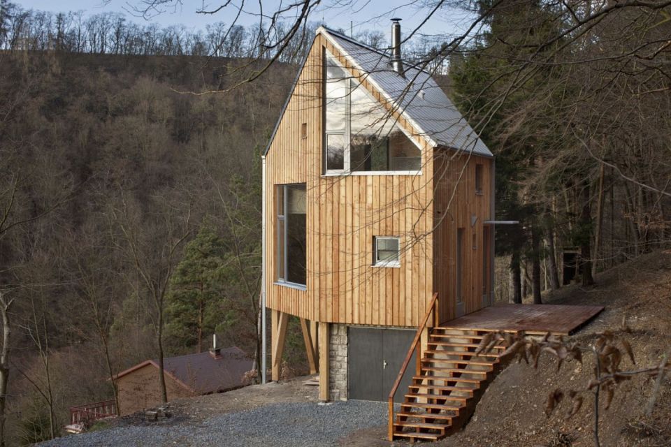A hexagon-shaped plan was chosen to maximize views and daylight in this small house that has 2 bedrooms in 1,012 sq ft. | www.facebook.com/SmallHouseBliss