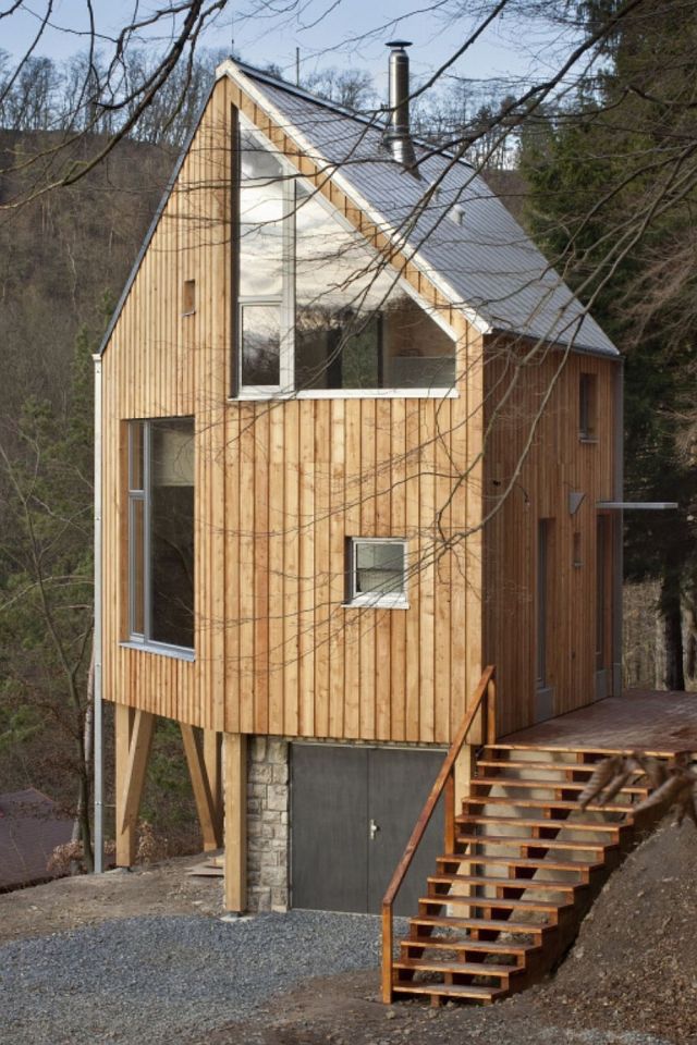 A hexagon-shaped plan was chosen to maximize views and daylight in this small house that has 2 bedrooms in 1,012 sq ft. | www.facebook.com/SmallHouseBliss