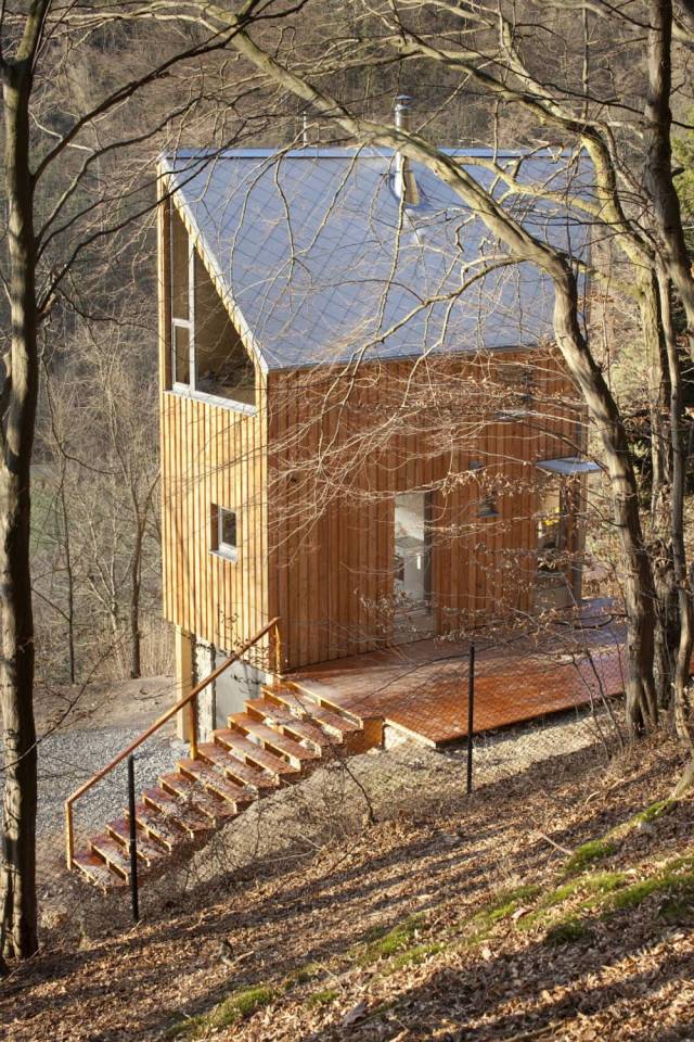 A hexagon-shaped plan was chosen to maximize views and daylight in this small house that has 2 bedrooms in 1,012 sq ft. | www.facebook.com/SmallHouseBliss