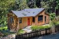 A woodsy cottage by architect Cathy Schwabe with 2 bedrooms in 840 sq ft | www.facebook.com/SmallHouseBliss