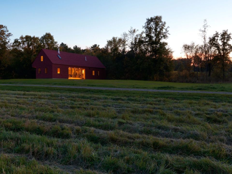 This modern farmhouse in Vermont was inspired by the area's barns and covered bridges. It has three bedrooms and a loft in 1,500 sq ft. | www.facebook.com/SmallHouseBliss