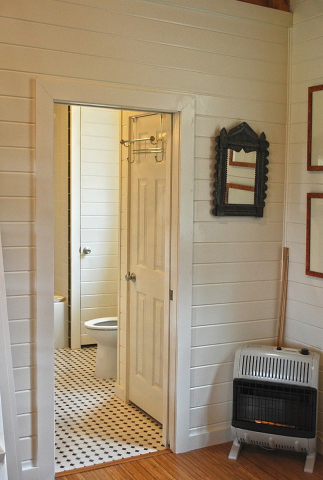 This Texas Hill Country cottage by Kanga Room Systems is a 480 sq ft studio with loft bedroom plus 432 sq ft of porches | www.facebook.com/SmallHouseBliss