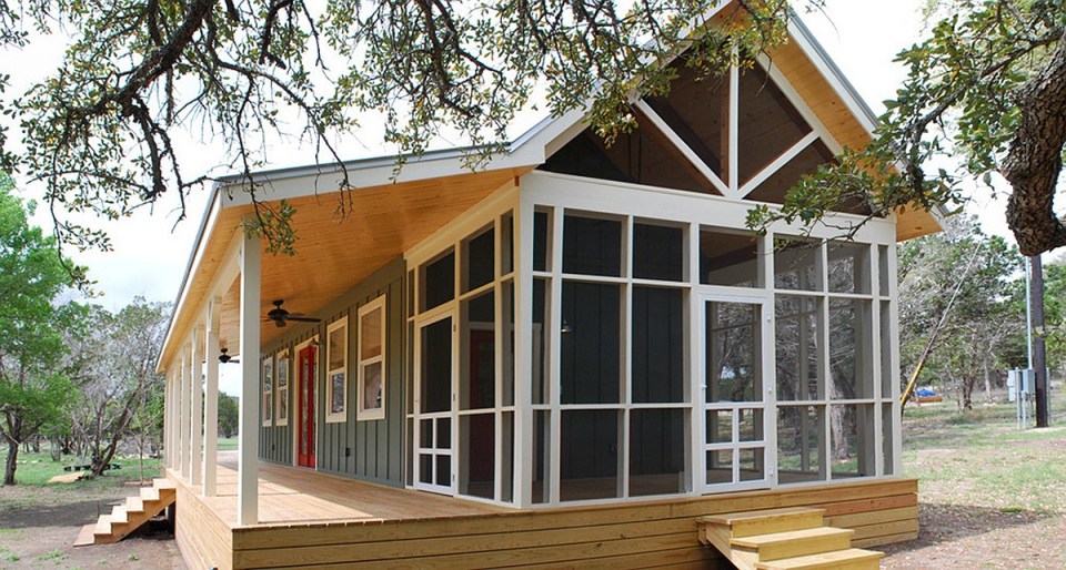 This Texas Hill Country cottage by Kanga Room Systems is a 480 sq ft studio with loft bedroom plus 432 sq ft of porches | www.facebook.com/SmallHouseBliss