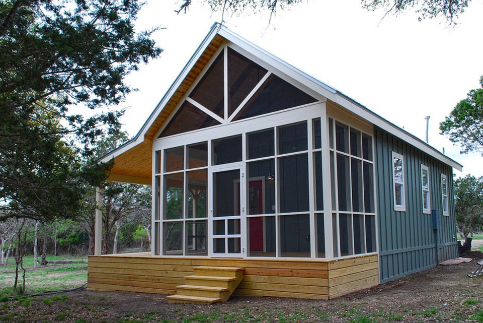 This Texas Hill Country cottage by Kanga Room Systems is a 480 sq ft studio with loft bedroom plus 432 sq ft of porches | www.facebook.com/SmallHouseBliss