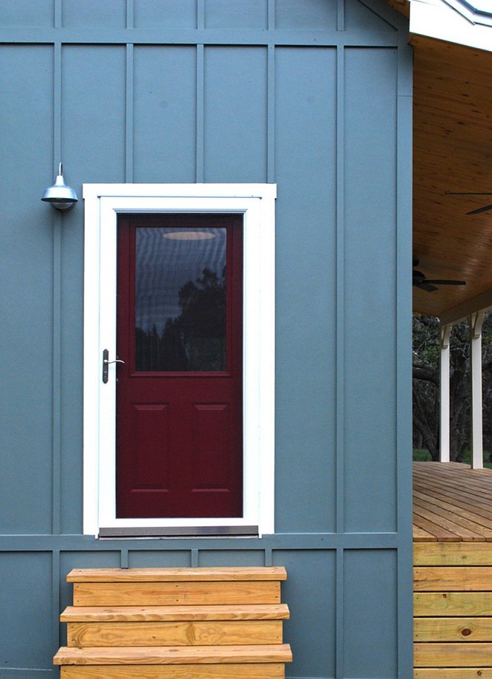 This Texas Hill Country cottage by Kanga Room Systems is a 480 sq ft studio with loft bedroom plus 432 sq ft of porches | www.facebook.com/SmallHouseBliss