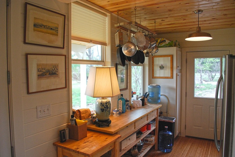 This Texas Hill Country cottage by Kanga Room Systems is a 480 sq ft studio with loft bedroom plus 432 sq ft of porches | www.facebook.com/SmallHouseBliss