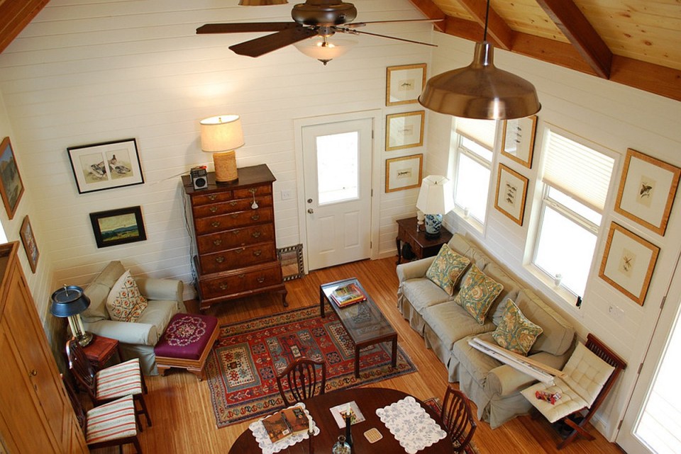 This Texas Hill Country cottage by Kanga Room Systems is a 480 sq ft studio with loft bedroom plus 432 sq ft of porches | www.facebook.com/SmallHouseBliss