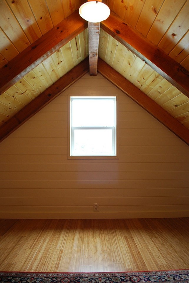 This Texas Hill Country cottage by Kanga Room Systems is a 480 sq ft studio with loft bedroom plus 432 sq ft of porches | www.facebook.com/SmallHouseBliss