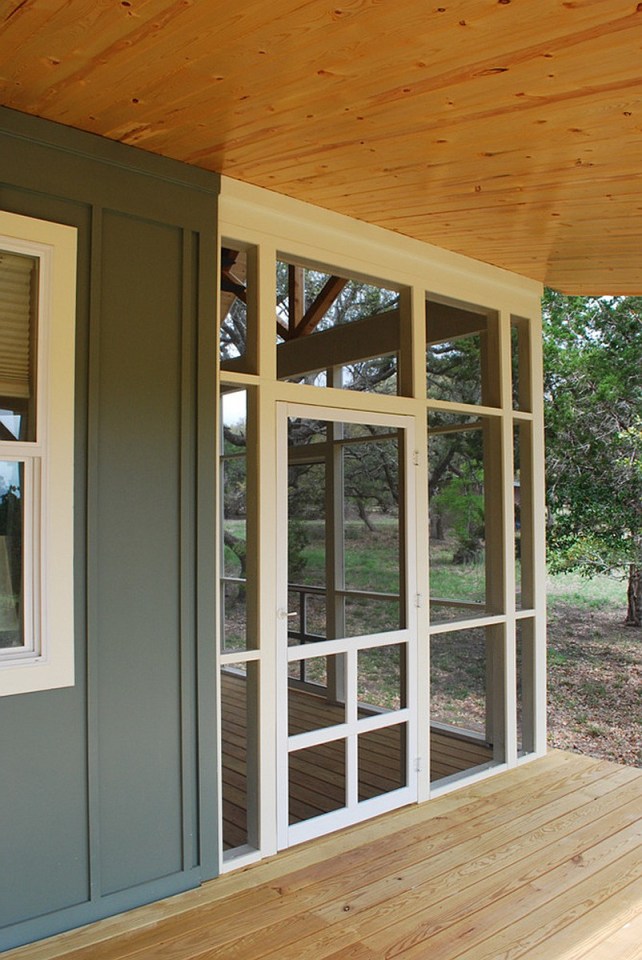This Texas Hill Country cottage by Kanga Room Systems is a 480 sq ft studio with loft bedroom plus 432 sq ft of porches | www.facebook.com/SmallHouseBliss