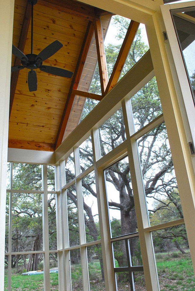 This Texas Hill Country cottage by Kanga Room Systems is a 480 sq ft studio with loft bedroom plus 432 sq ft of porches | www.facebook.com/SmallHouseBliss