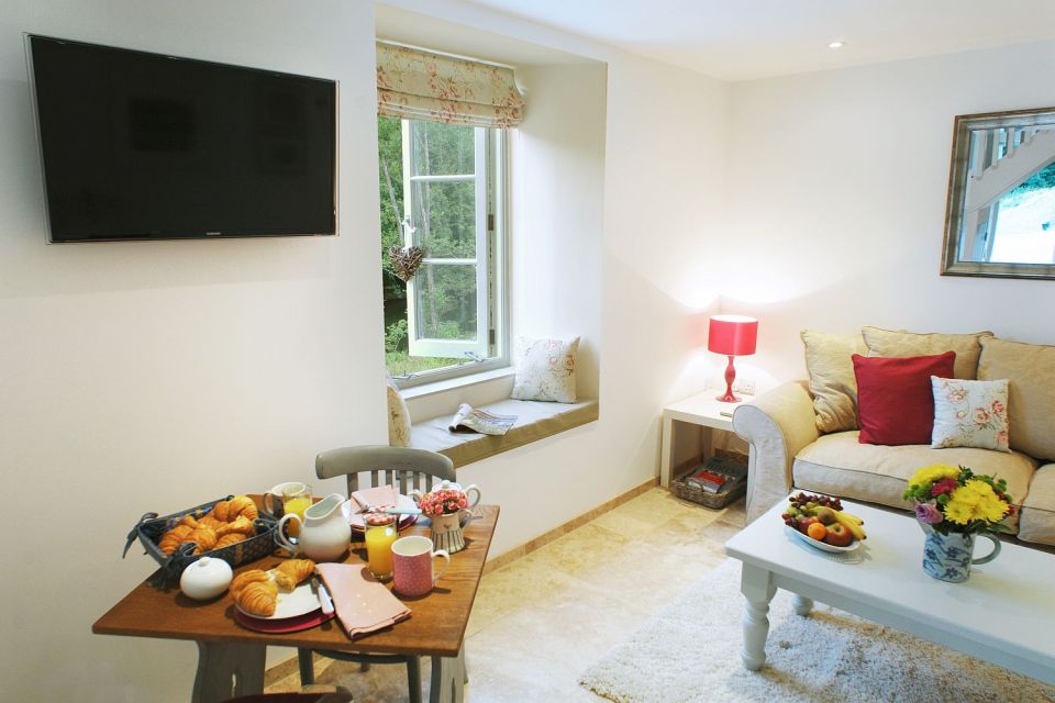 This restored worker's cottage dating from the mid-19th century has 590 sq ft on the main floor and a bedroom in the attic. | www.facebook.com/SmallHouseBliss