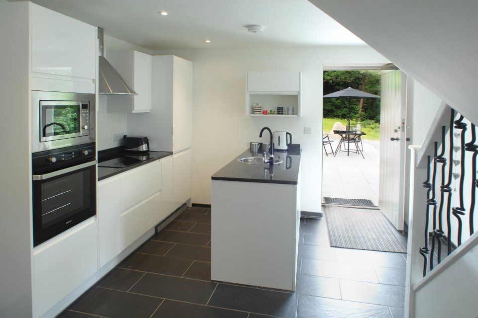 This restored worker's cottage dating from the mid-19th century has 590 sq ft on the main floor and a bedroom in the attic. | www.facebook.com/SmallHouseBliss