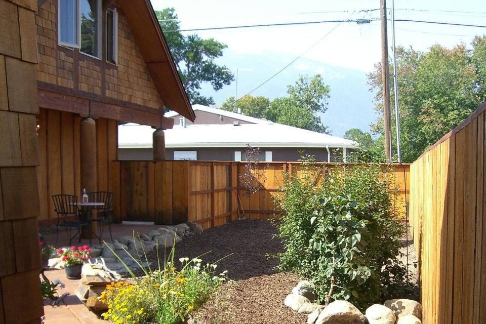 A cozy coach house garage with loft-style apartment above | www.facebook.com/SmallHouseBliss