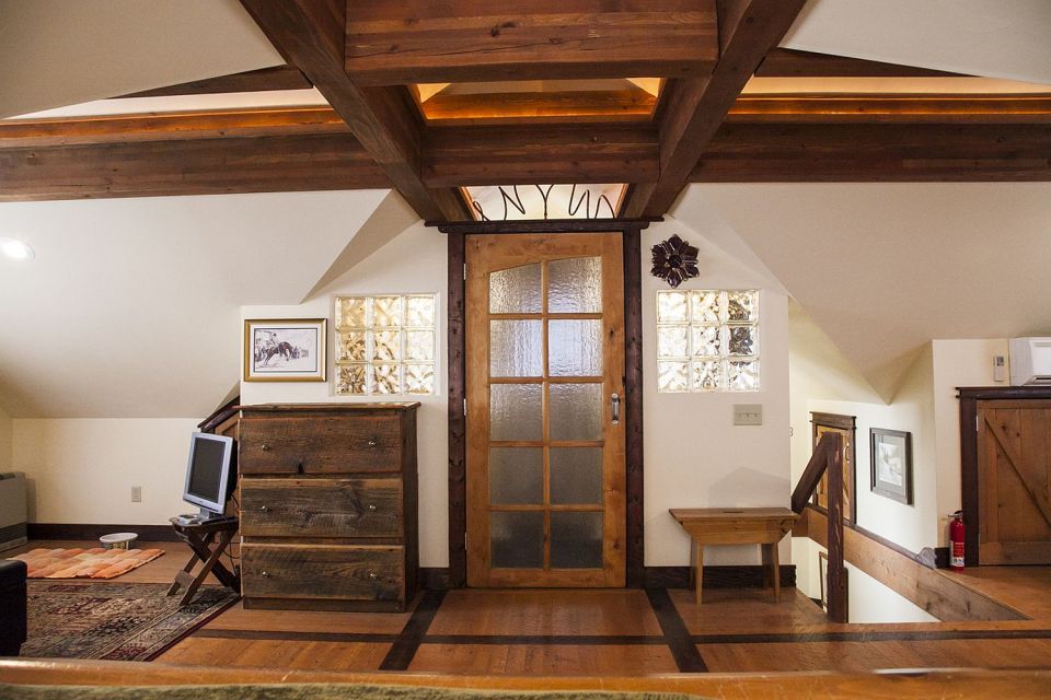 A cozy coach house garage with loft-style apartment above | www.facebook.com/SmallHouseBliss