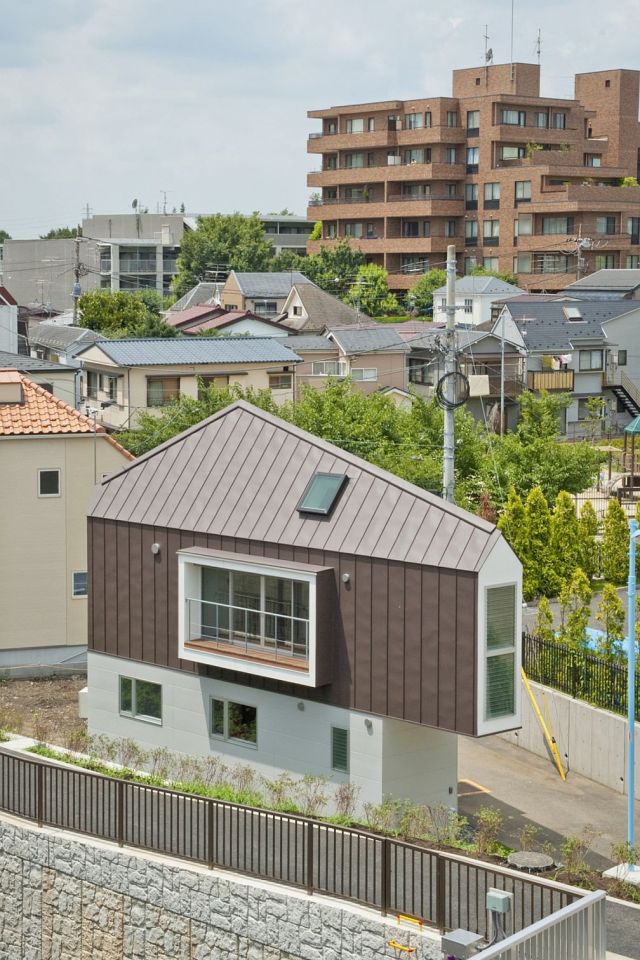 This 2-bedroom house on a tiny sliver of a site seems larger than its 595 sq ft. | www.facebook.com/SmallHouseBliss