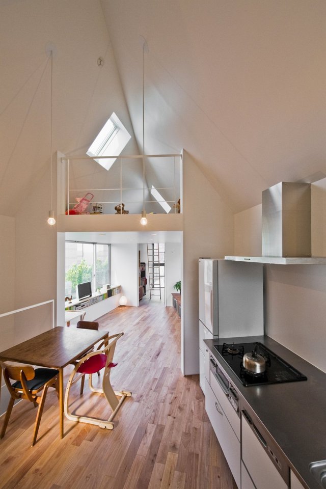 This 2-bedroom house on a tiny sliver of a site seems larger than its 595 sq ft. | www.facebook.com/SmallHouseBliss