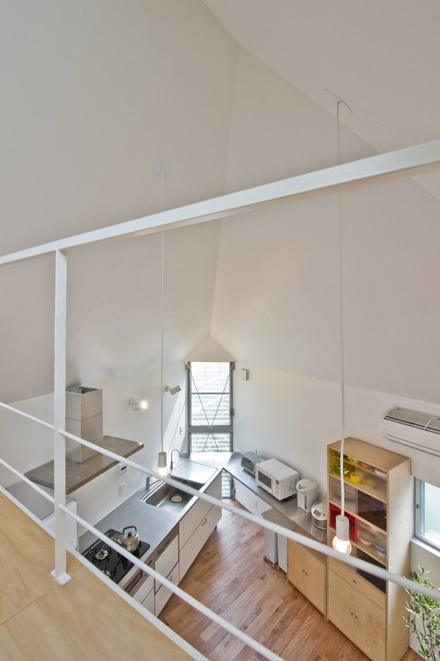 This 2-bedroom house on a tiny sliver of a site seems larger than its 595 sq ft. | www.facebook.com/SmallHouseBliss