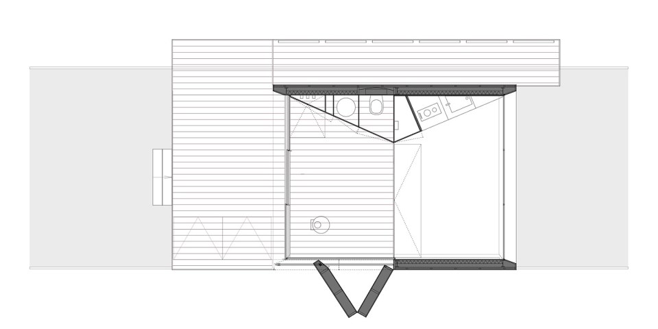 This tiny 226 sq ft lake house opens to the outdoors with a folding wall. 2by4-architects has also designed a prefab version. | www.facebook.com/SmallHouseBliss
