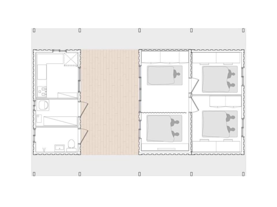 This low-cost shipping container house is covered by a tent-like polycarbonate structure to create semi-outdoor spaces between and around the containers. | www.facebook.com/SmallHouseBliss