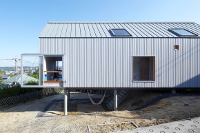 This small house offers a harmonious living space for a family displaced by the 2011 earthquake in Japan. It has 2 bedrooms and loft space in 1,281 sq ft. | www.facebook.com/SmallHouseBliss