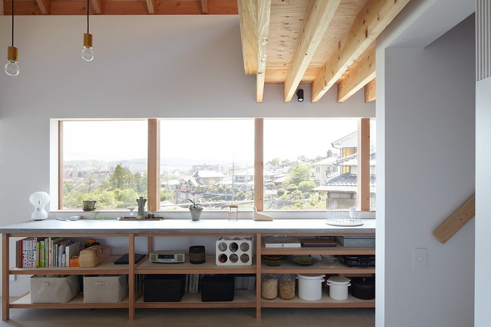 This small house offers a harmonious living space for a family displaced by the 2011 earthquake in Japan. It has 2 bedrooms and loft space in 1,281 sq ft. | www.facebook.com/SmallHouseBliss