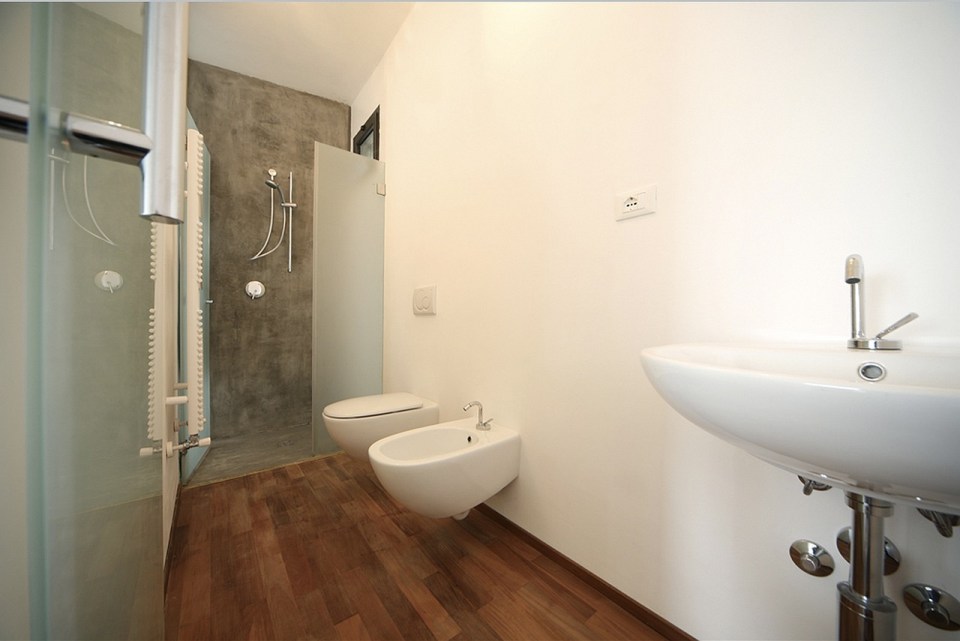 A 377 sq ft studio retreat in Italy with a stepped floor plan to follow the terraced site. | www.facebook.com/SmallHouseBliss