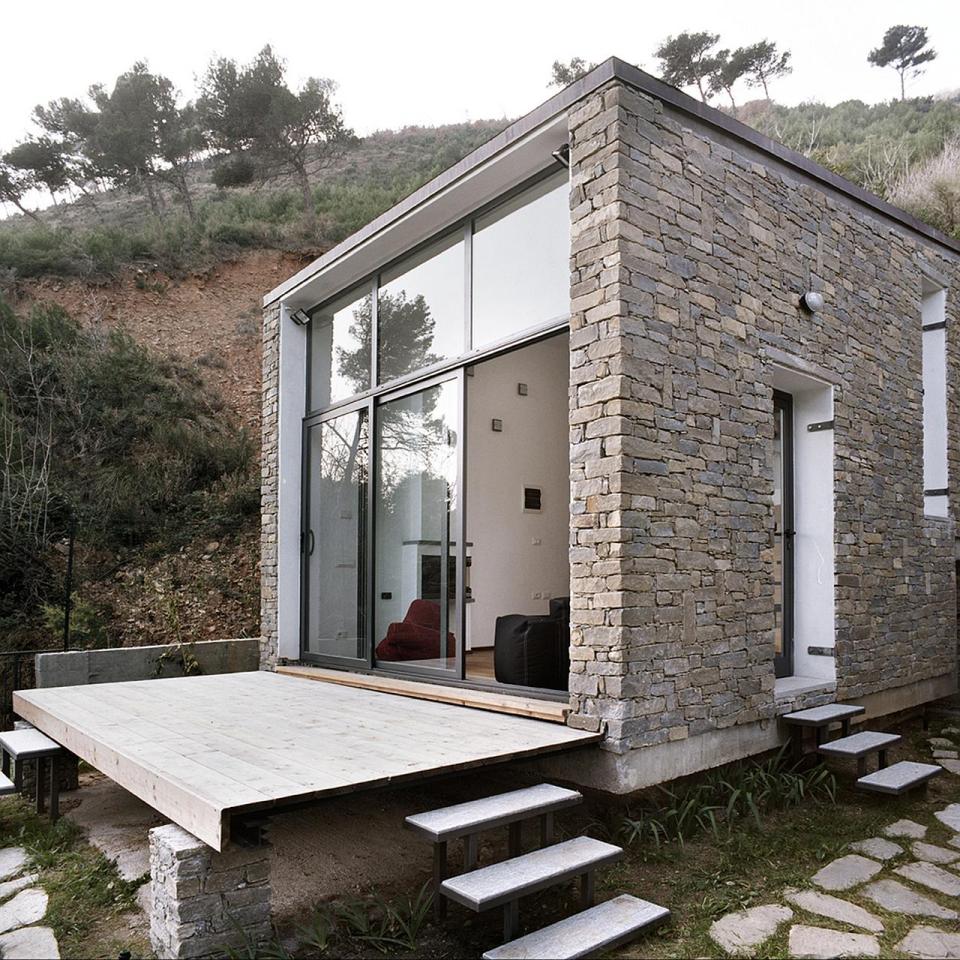 A 377 sq ft studio retreat in Italy with a stepped floor plan to follow the terraced site. | www.facebook.com/SmallHouseBliss