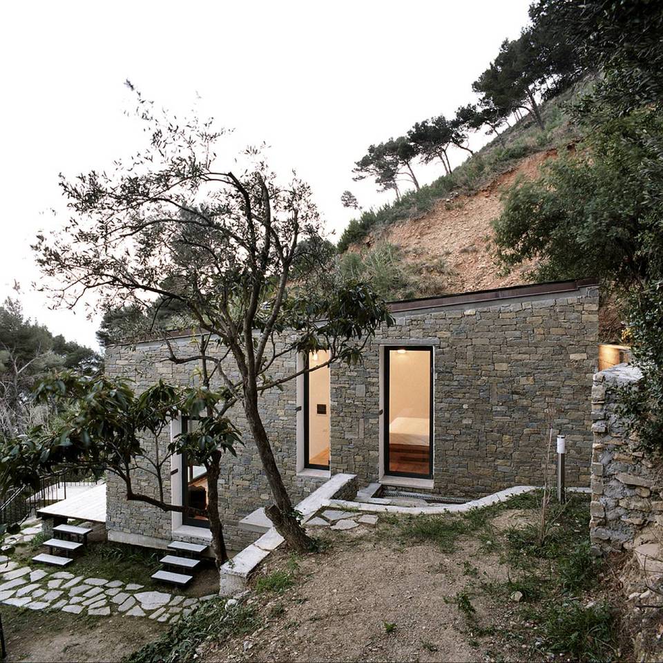 A 377 sq ft studio retreat in Italy with a stepped floor plan to follow the terraced site. | www.facebook.com/SmallHouseBliss