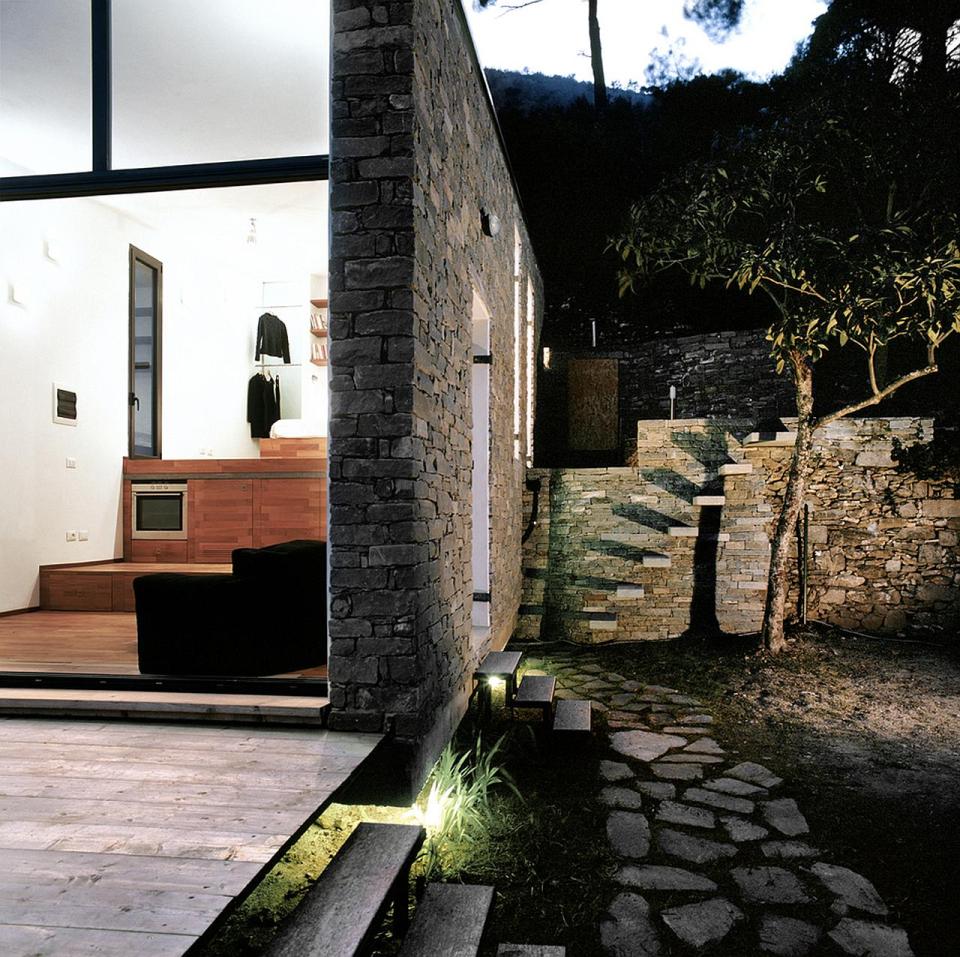 A 377 sq ft studio retreat in Italy with a stepped floor plan to follow the terraced site. | www.facebook.com/SmallHouseBliss