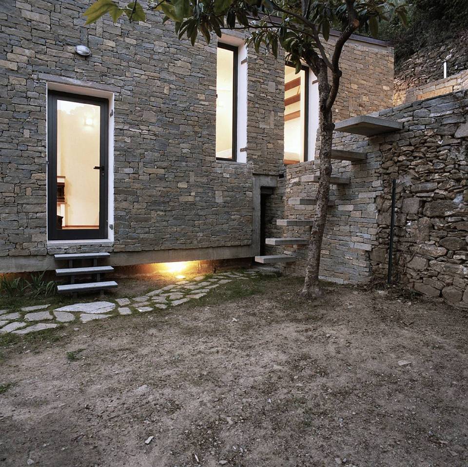 A 377 sq ft studio retreat in Italy with a stepped floor plan to follow the terraced site. | www.facebook.com/SmallHouseBliss