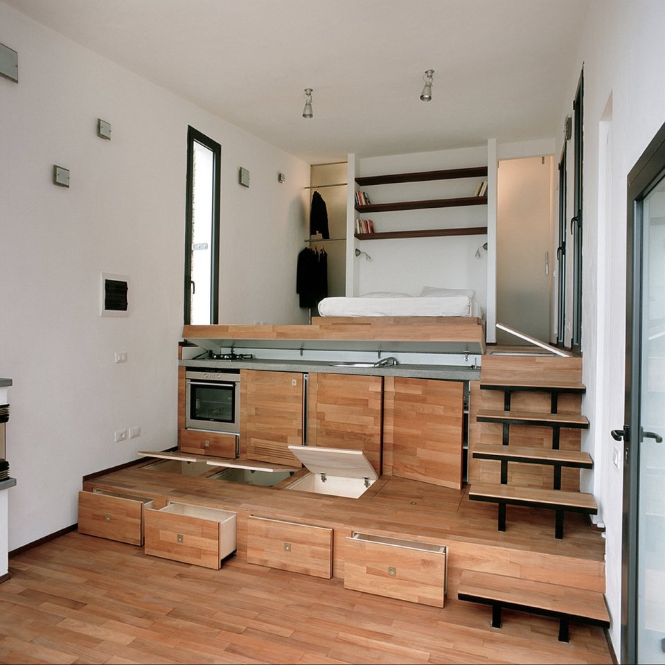 A 377 sq ft studio retreat in Italy with a stepped floor plan to follow the terraced site. | www.facebook.com/SmallHouseBliss