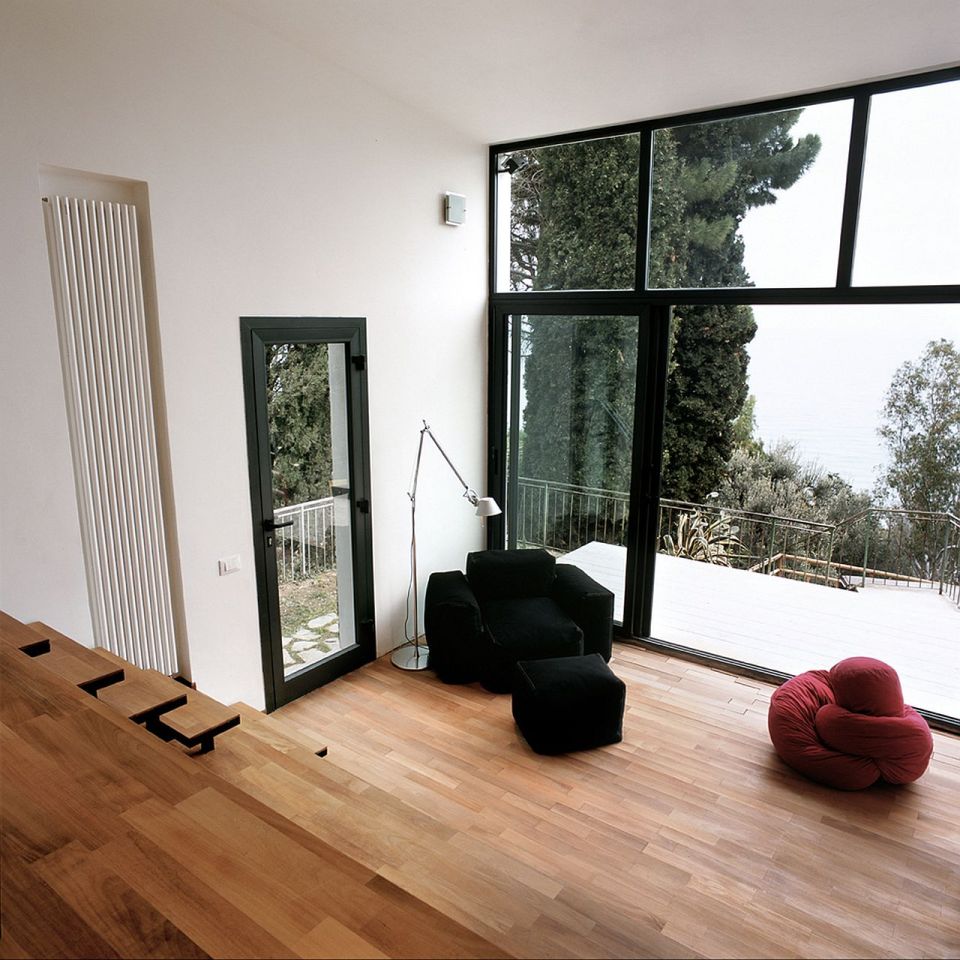 A 377 sq ft studio retreat in Italy with a stepped floor plan to follow the terraced site. | www.facebook.com/SmallHouseBliss