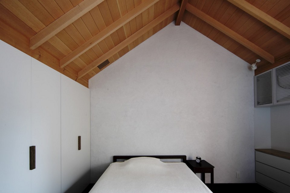 This wood family house has 4 bedrooms in a 1,359 sq ft cross-shaped floor plan. | www.facebook.com/SmallHouseBliss