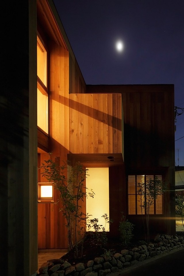 This wood family house has 4 bedrooms in a 1,359 sq ft cross-shaped floor plan. | www.facebook.com/SmallHouseBliss