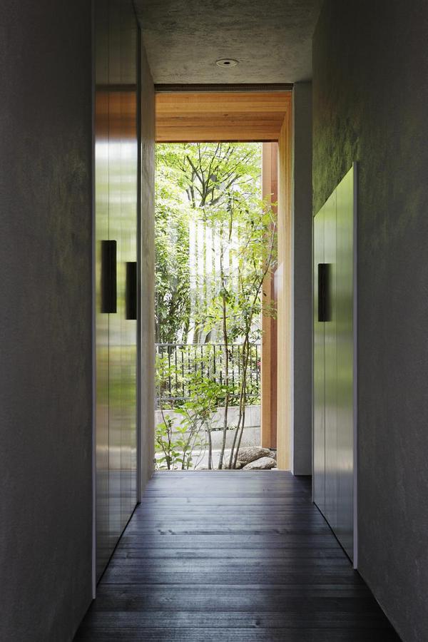 This wood family house has 4 bedrooms in a 1,359 sq ft cross-shaped floor plan. | www.facebook.com/SmallHouseBliss