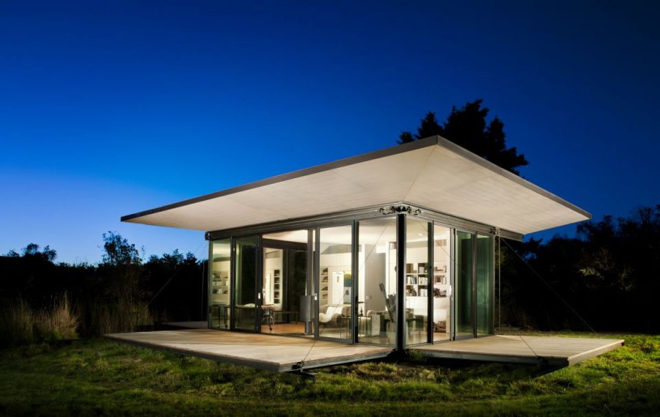 This modern cabin by Olson Kundig Architects is open to nature with glass walls on three sides. It has 500 sq ft of studio living space. | www.facebook.com/SmallHouseBliss