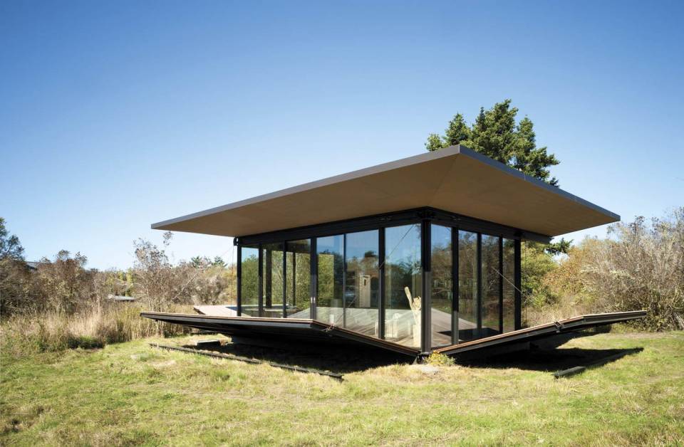 This modern cabin by Olson Kundig Architects is open to nature with glass walls on three sides. It has 500 sq ft of studio living space. | www.facebook.com/SmallHouseBliss