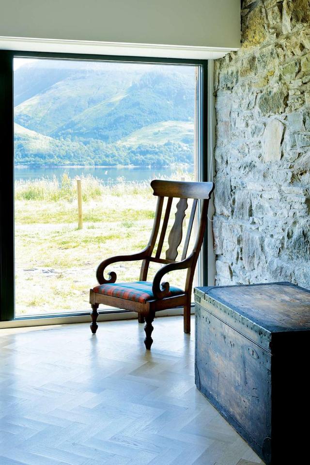 An old stone horse barn in Scotland was converted into this small house with 1 bedroom and a large loft in 1,291 sq ft. | www.facebook.com/SmallHouseBliss