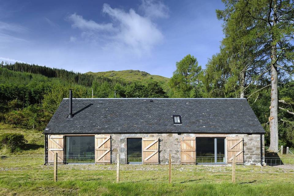 An old stone horse barn in Scotland was converted into this small house with 1 bedroom and a large loft in 1,291 sq ft. | www.facebook.com/SmallHouseBliss