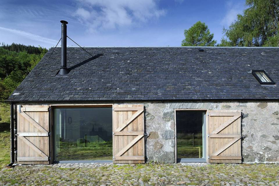 An old stone horse barn in Scotland was converted into this small house with 1 bedroom and a large loft in 1,291 sq ft. | www.facebook.com/SmallHouseBliss