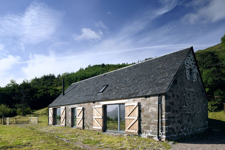 An old stone horse barn in Scotland was converted into this small house with 1 bedroom and a large loft in 1,291 sq ft. | www.facebook.com/SmallHouseBliss